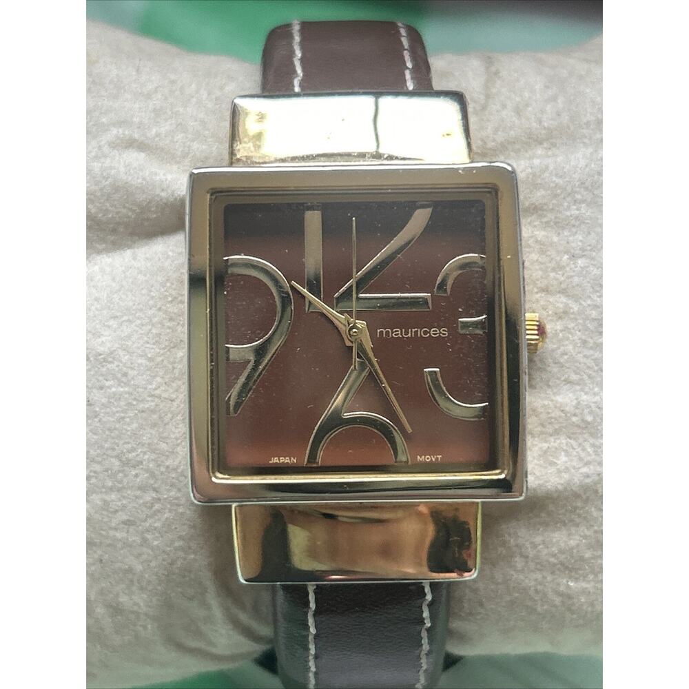 Maurice’s Gold Tone Brown Band Womens Cuff Watch